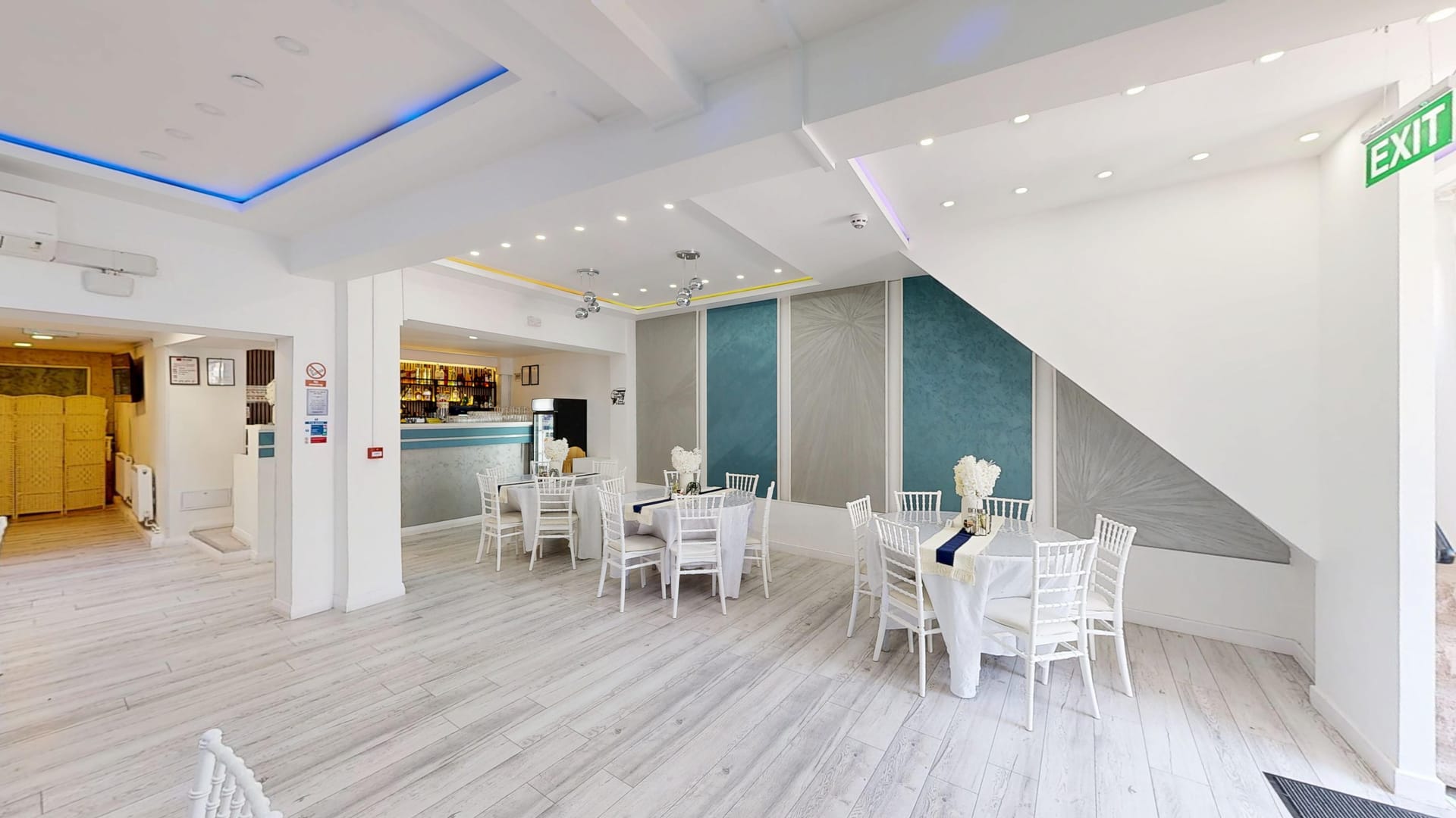 The dining hall at Restaurant Acasă looking towards the entrance